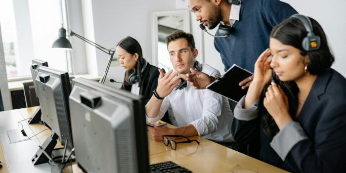 Men Looking at the Screen of a Computer